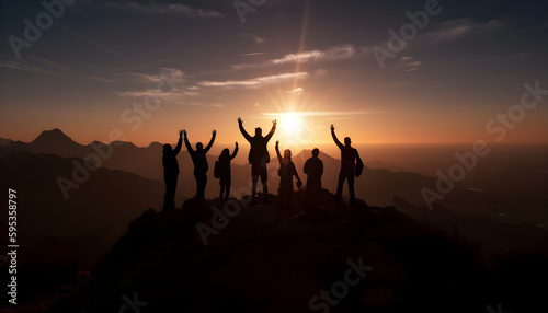 Corporate team celebrating success on a mountain top
