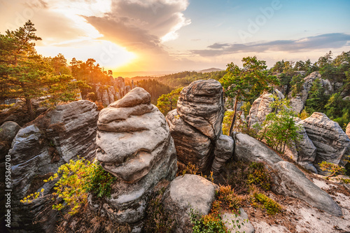 Fotografie, Obraz Cesky raj sandstone cliffs - Prachovske skaly in summer sunset, Czech Republic
