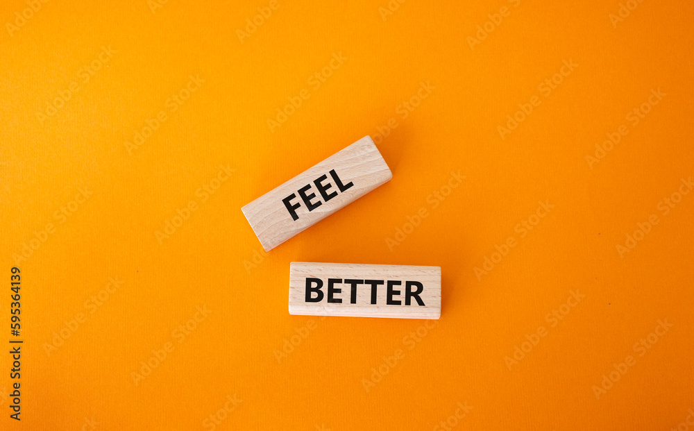 Feel better symbol. Wooden blocks with words Feel better. Beautiful orange background. Business and Feel better concept. Copy space. Feel better symbol. Wooden blocks with words Feel better. Beautiful orange background. Business and Feel better concept. Copy space.