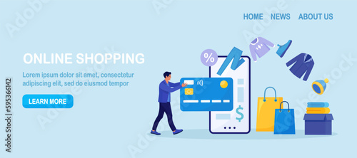 Online shopping. Man purchasing clothes from website, virtually insert credit card to phone for payment. Shopper buying on internet sale. Special offer. Buyer picked goods, paid with mobile banking