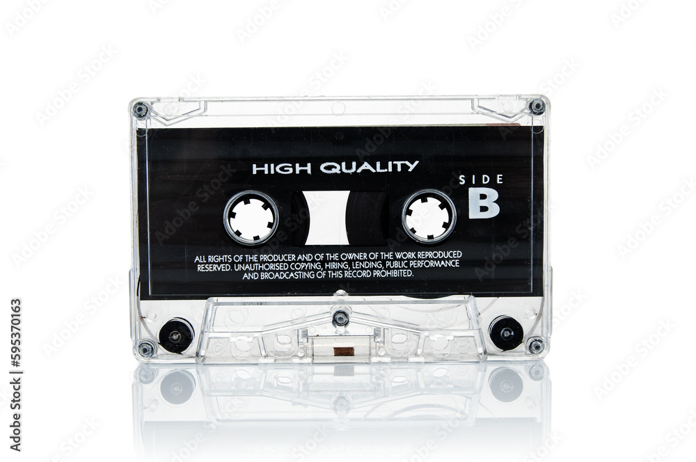 Fototapeta premium Old vintage audio cassette close up isolated on white background