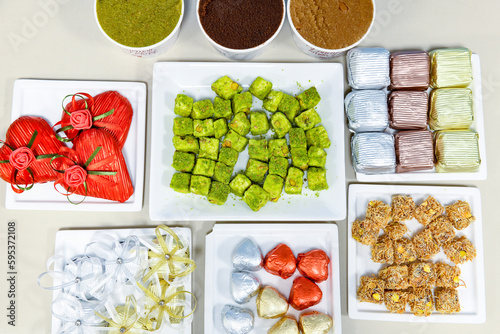 Table scene of assorted take out or delivery foods. Traditional Turkish cuisine. Various Turkish meal and appetizers. Top down view on a table. photo