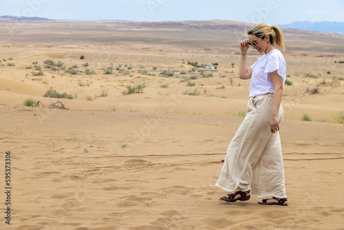 Woman walking at Desert