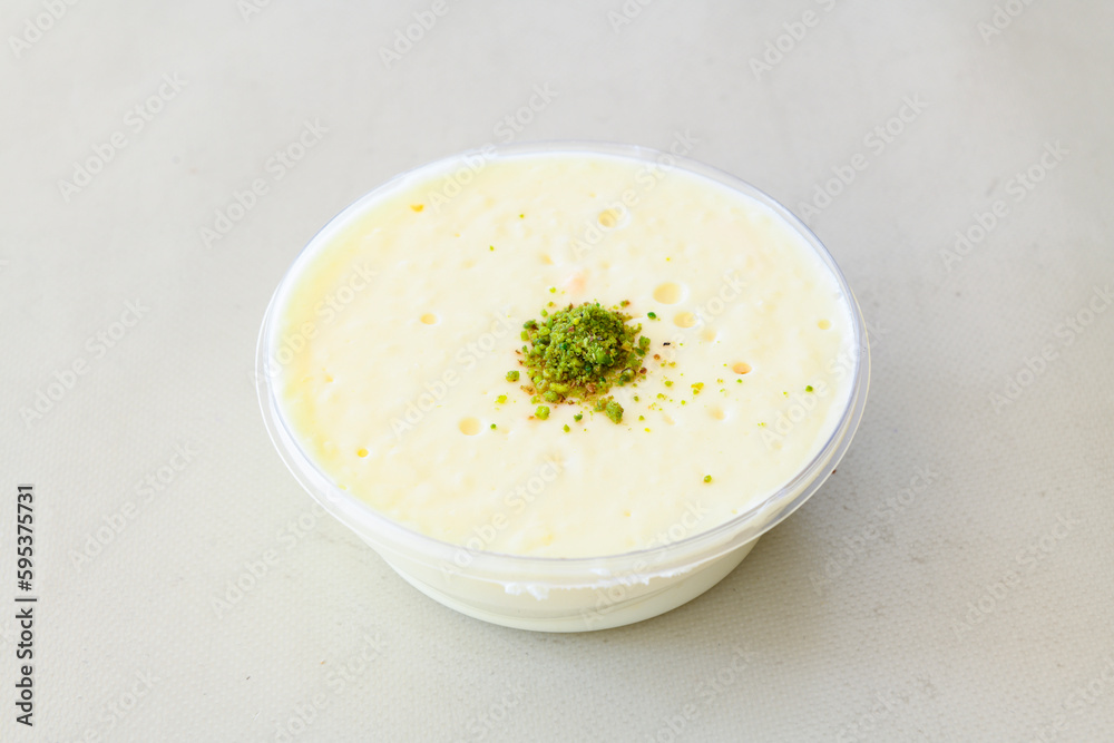 Table scene of assorted take out or delivery foods. Traditional Turkish cuisine. Various Turkish desert and cake. Top down view on a table. Table scene of assorted take out or delivery foods. Traditional Turkish cuisine. Various Turkish desert and cake. Top down view on a table.