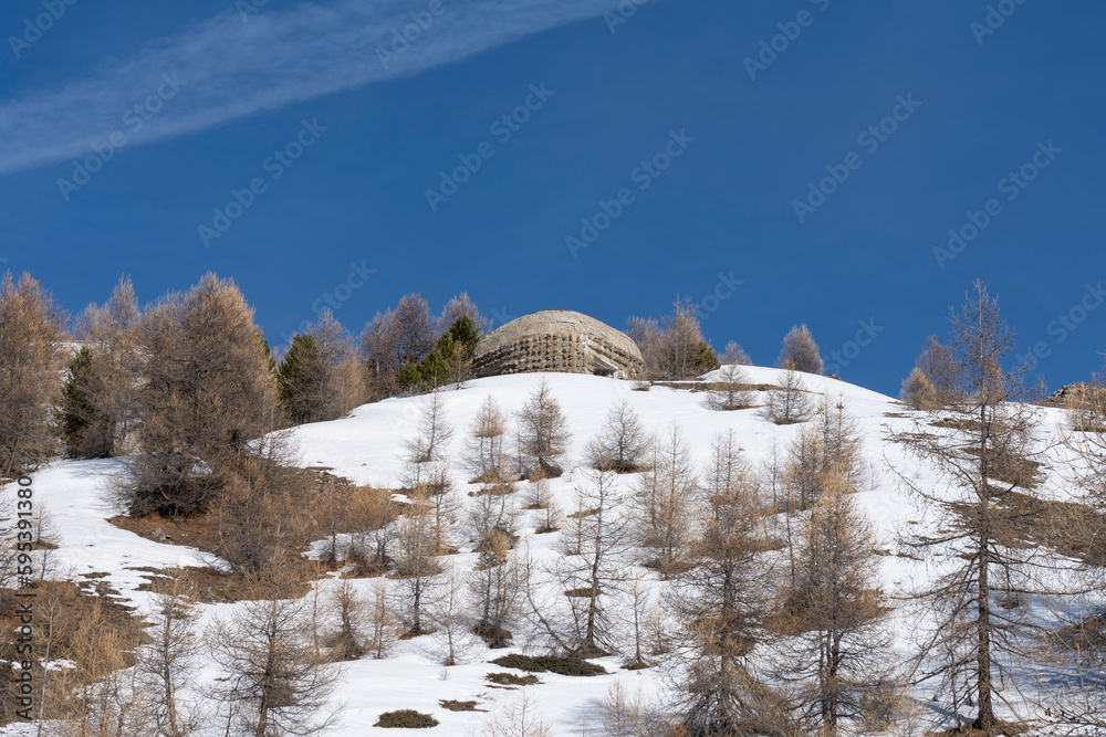 world war bunker on top of the snowy mountain in the Italian Alps. Ruins of an ancient fortress