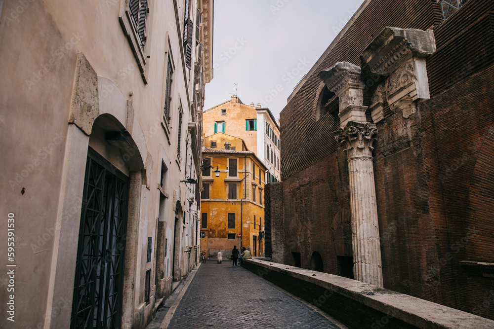 Walking through the city streets of ancient Rome in Italy