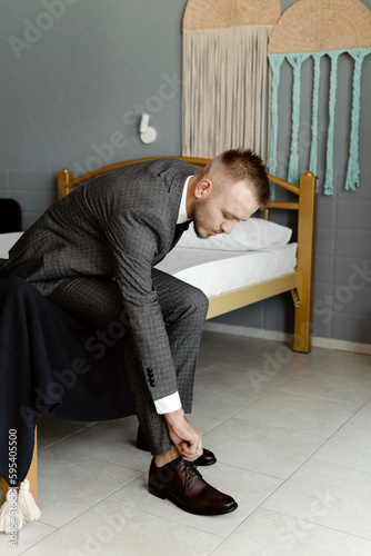 Married life here I am. Shot of a handsome young man getting ready and getting ready at the hotel on his wedding day.