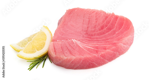 Fresh raw tuna fillet with lemon slices and rosemary on white background