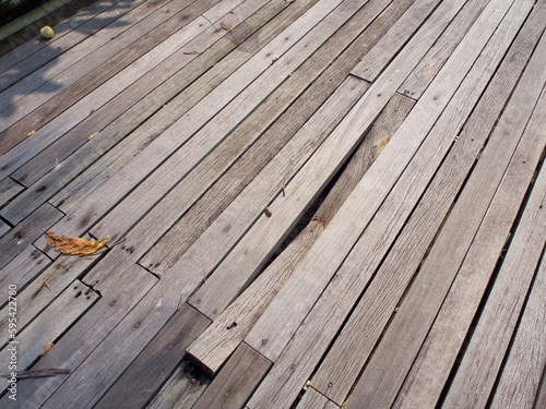 Damaged outdoor wooden plank at Changi Broadwalk photo