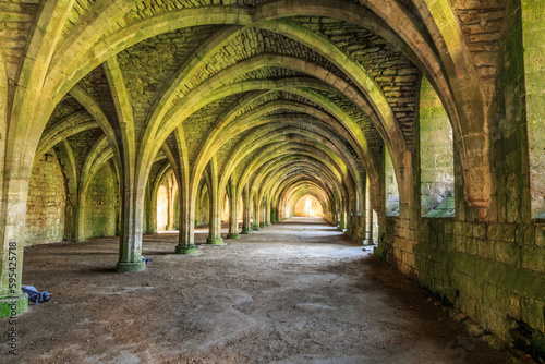 England, North Yorkshire, Ripon. Fountains Abbey, Studley Royal. UNESCO World Heritage Site. Cistercian Monastery. Ruins of vaulted cellarium where food was stored. 2017-05-03