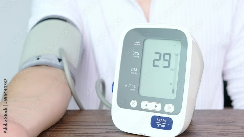 Title
Man checks blood pressure monitor and heart rate monitor with digital pressure gauge. Health care and Medical concept.
Title
Man checks blood pressure monitor and heart rate monitor with digital pressure gauge. Health care and Medical concept.