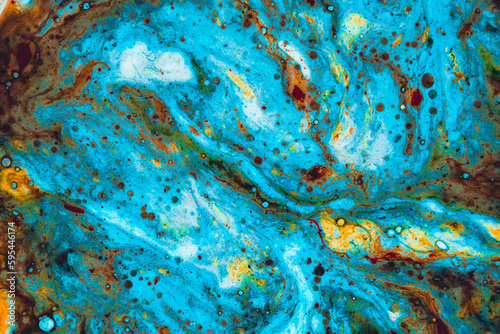 Abstract art created with colored paints. Shapes reminiscent of fantasy universes.