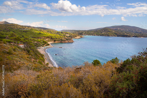 High angle view over Norsi Beach, dark sand beach situated in the gulf of stella, Elba island, Italy