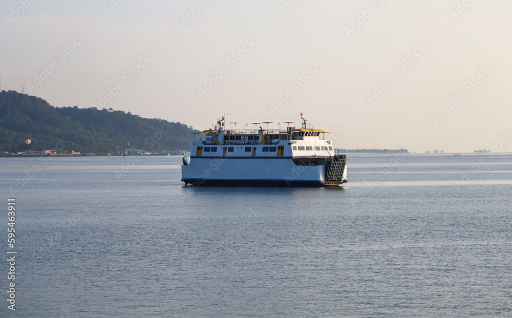 passenger ships at sea. Mountains in the background, ferry boat sailing in the bali strait, Indonesia