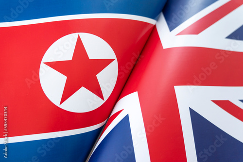 Flags Great Britain and north korea. concept of international relations between countries. The state of governments. Friendship of peoples. photo