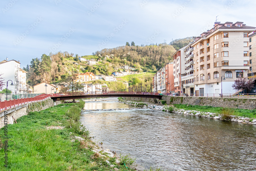 Narcea river as it passes through the center of the city of Cangas del Narcea in Asturias, Spain
