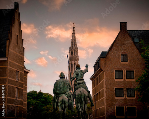 statue of Don Quixote looking at the city hall of Brussels.