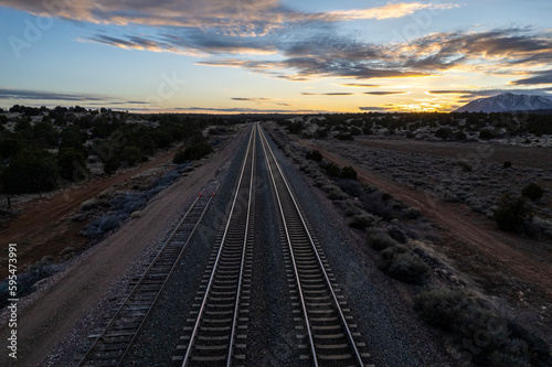 two railroad tracks recede into distance at sunset, Arizona