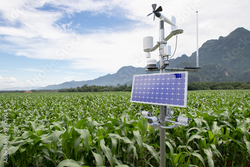 Weather station in corn field, 5G technology with smart farming concept
