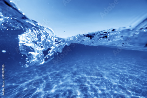 texture of transparent clear water in the pool blue abstract background © kichigin19