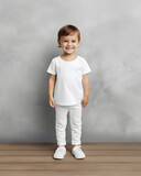 Cute toddler wearing white clothing.