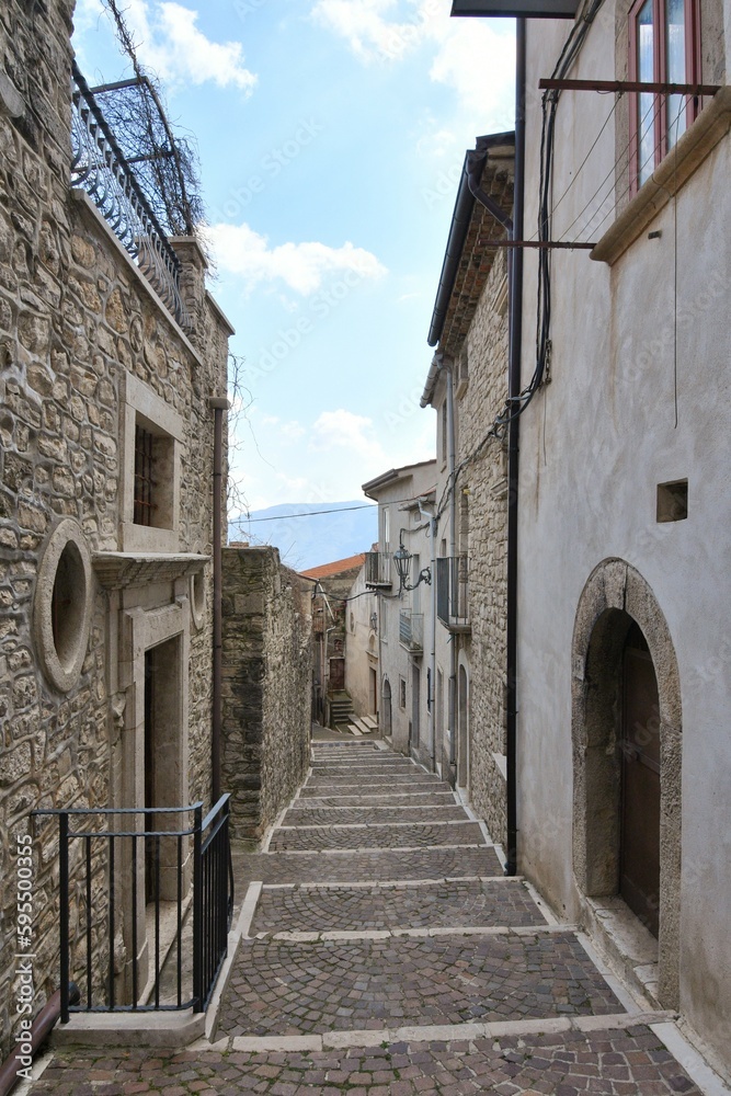 A narrow street among the old houses of San Lupo, a small town of Benevento province, Italy.