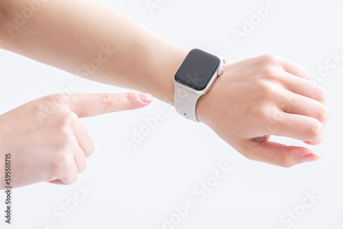 hand with digital watch デジタル腕時計