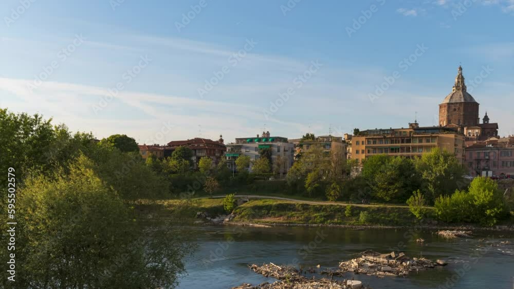 Ponte Coperto (covered bridge) and Duomo di Pavia (Pavia Cathedral) in Pavia at sunset,Lombardy, italy. motion Timelapse at 30 fps Ponte Coperto (covered bridge) and Duomo di Pavia (Pavia Cathedral) in Pavia at sunset,Lombardy, italy. motion Timelapse at 30 fps