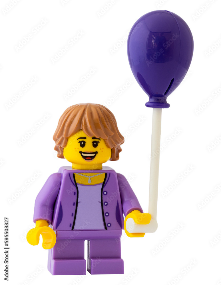 Obraz premium Dortmund - Deutschland 23. April 2023 Lego Minifigure Mädchen mit lila Luftballon