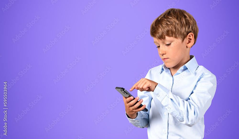 Boy portrait finger touch phone in hand, online messenger copy space Boy portrait finger touch phone in hand, online messenger copy space