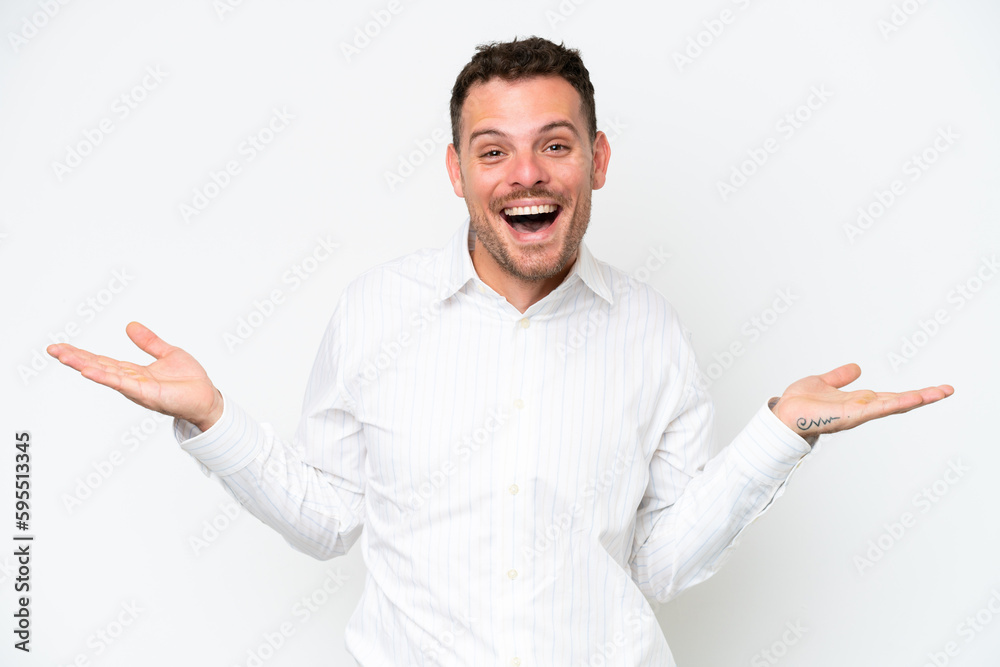 Young caucasian handsome man isolated on white background with shocked facial expression Young caucasian handsome man isolated on white background with shocked facial expression