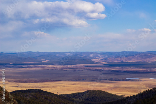 Aerial view of scenic mountains and valleys in spring from mountain peak