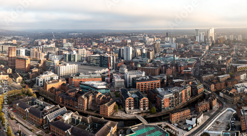 Aerial panorama of Leeds cityscape skyline with an early morning sunrise