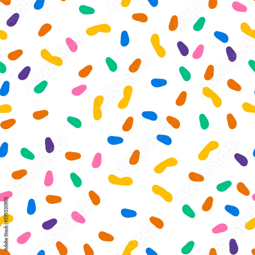 Seamless pattern with colorful dots sprinkles. Childish doodle print with confetti. Fun abstract scribble donut glaze background. Vector illustration