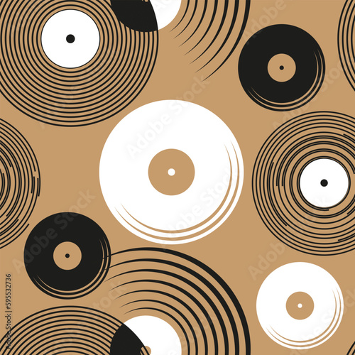 Seamless pattern with randomly arranged stylized images of vinyl records. Light brown background. Vector illustration