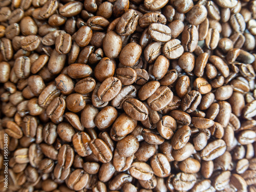 Coffee beans  natural light  selective focus on center  photo with a typical fisheye lens.