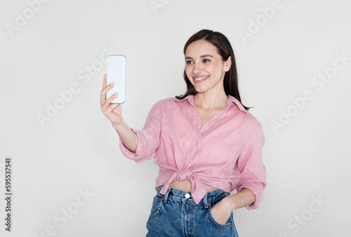 Konstfotografi Cheerful pretty young woman have video call with friends