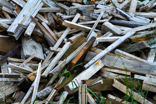 Pile of old timber wood on a backyard