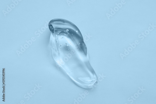 A smear of transparent gel on a blue background