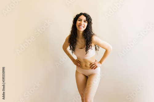 Mexican woman feeling happy about her body and self love