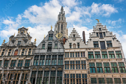 Beautiful historic facades of the manor houses at the Great Market square (Grote Markt) in Antwerp, Belgium, in summer against a blue sky © Sergey