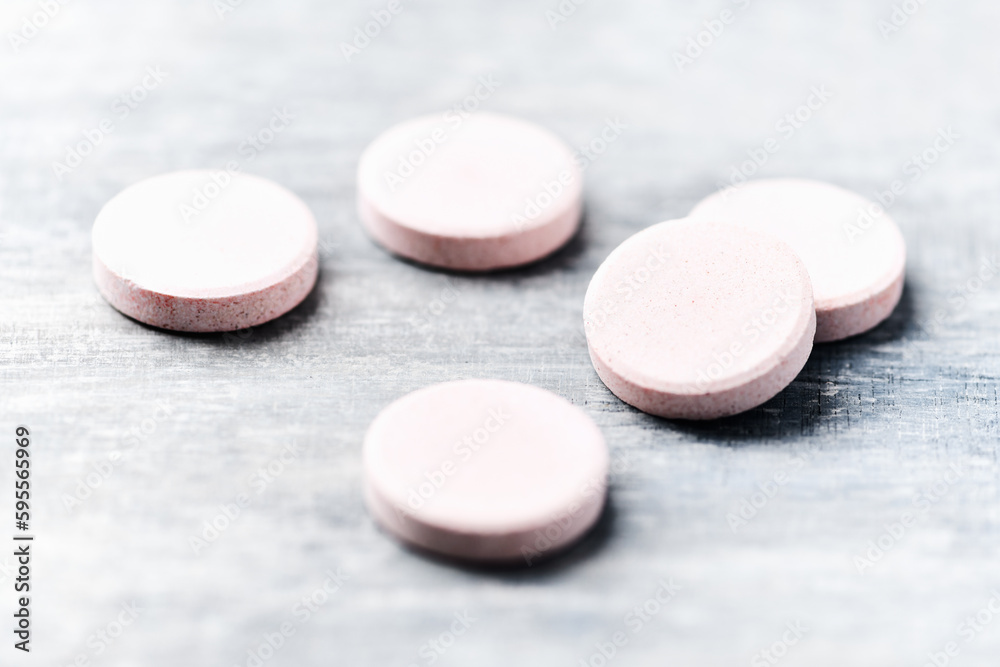 Collagen effervescent Tablets. Supplement to support collagen production. Bright wooden background. Close up. Copy space. Collagen effervescent Tablets. Supplement to support collagen production. Bright wooden background. Close up. Copy space.