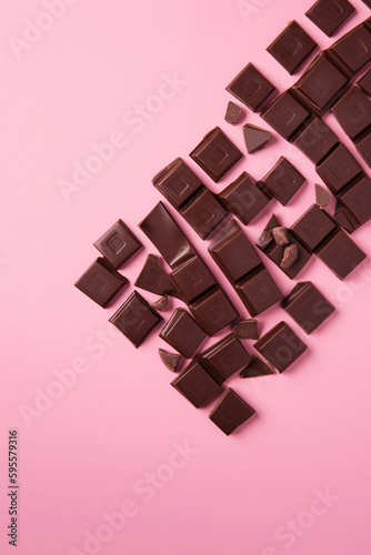 Generative ai. Bar of dark chocolate broken into pieces