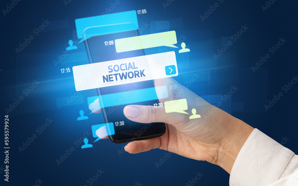Hand using smartphone with social media concept Hand using smartphone with social media concept