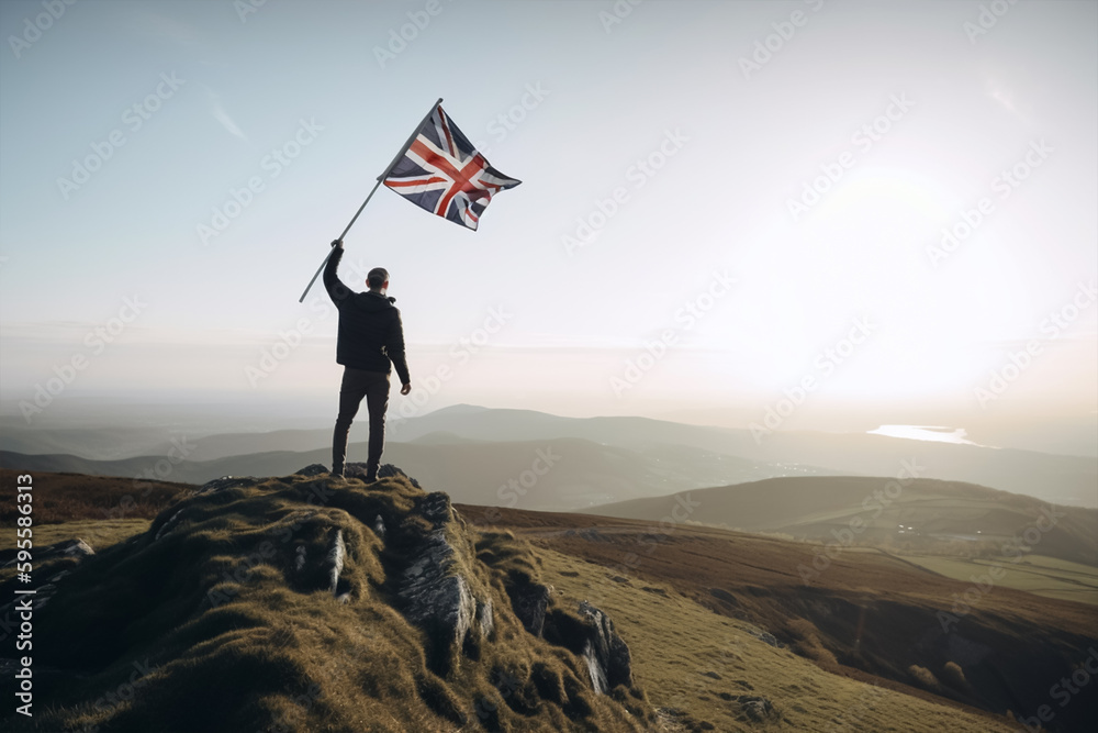 Obraz premium A man on top of a mountain holding a united kingdom flag, generative AI