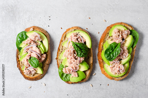 Tuna Avocado Toasts, Healthy Snack or Breakfast on Bright Background
