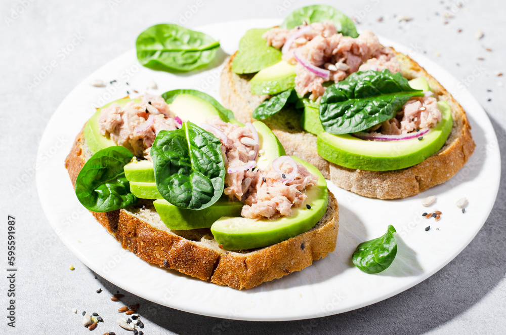 Tuna Avocado Toasts, Healthy Snack or Breakfast on Bright Background