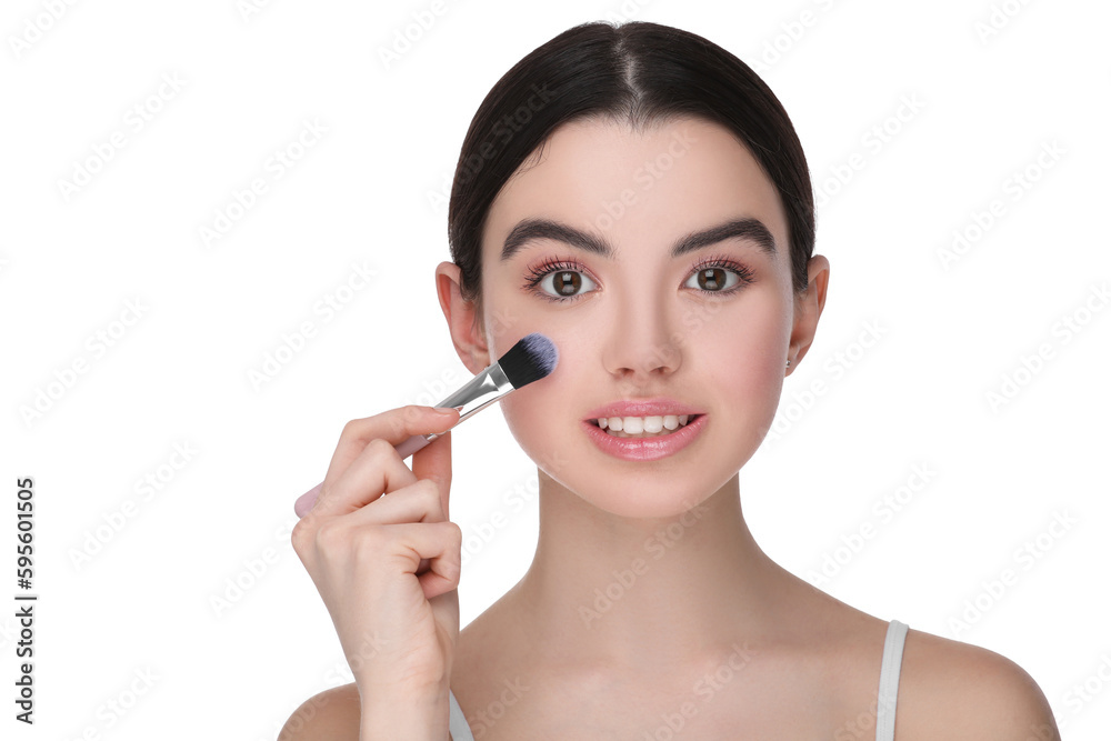 Teenage girl with makeup brush on white background Teenage girl with makeup brush on white background