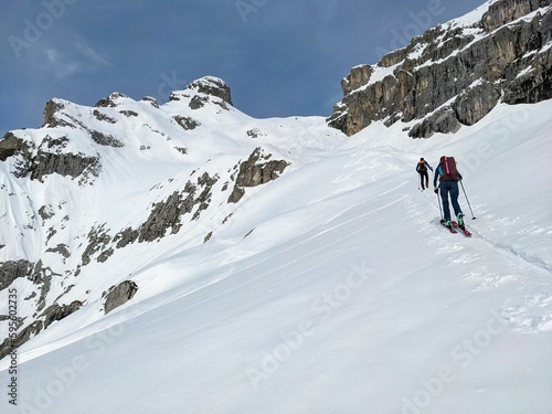 Summiteer. Skitour on the border mountain Sulzfluh Austria Switzerland. Ski mountaineering in a beautiful mountain world. Rätikon St.Antönien Switzerland