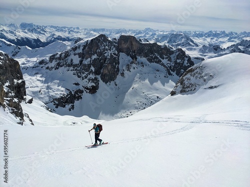 Ski tour in the beautiful swiss alps. Tour up to the highest point to the summit cross. mountains in winter. High quality photo